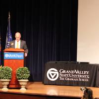 Man standing at podium